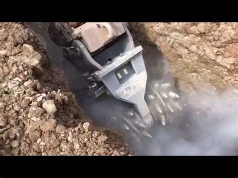 rock wheel attachment for excavator